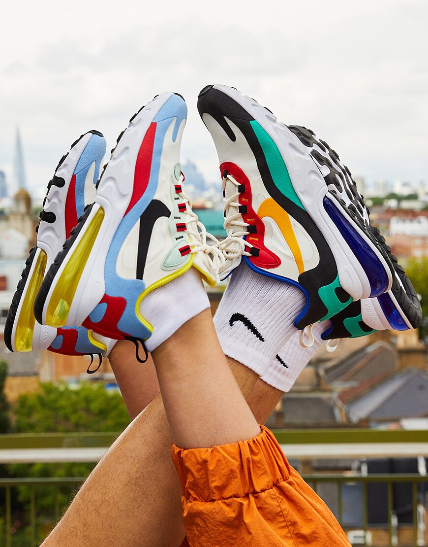 A picture of two models wearing the new Nike Air Max 270 React Bauhaus trainers. Available at ASOS.
