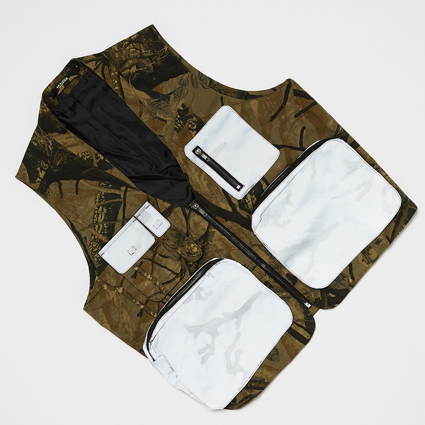 A picture of a camo utility gilet with reflective pockets. Available at ASOS.