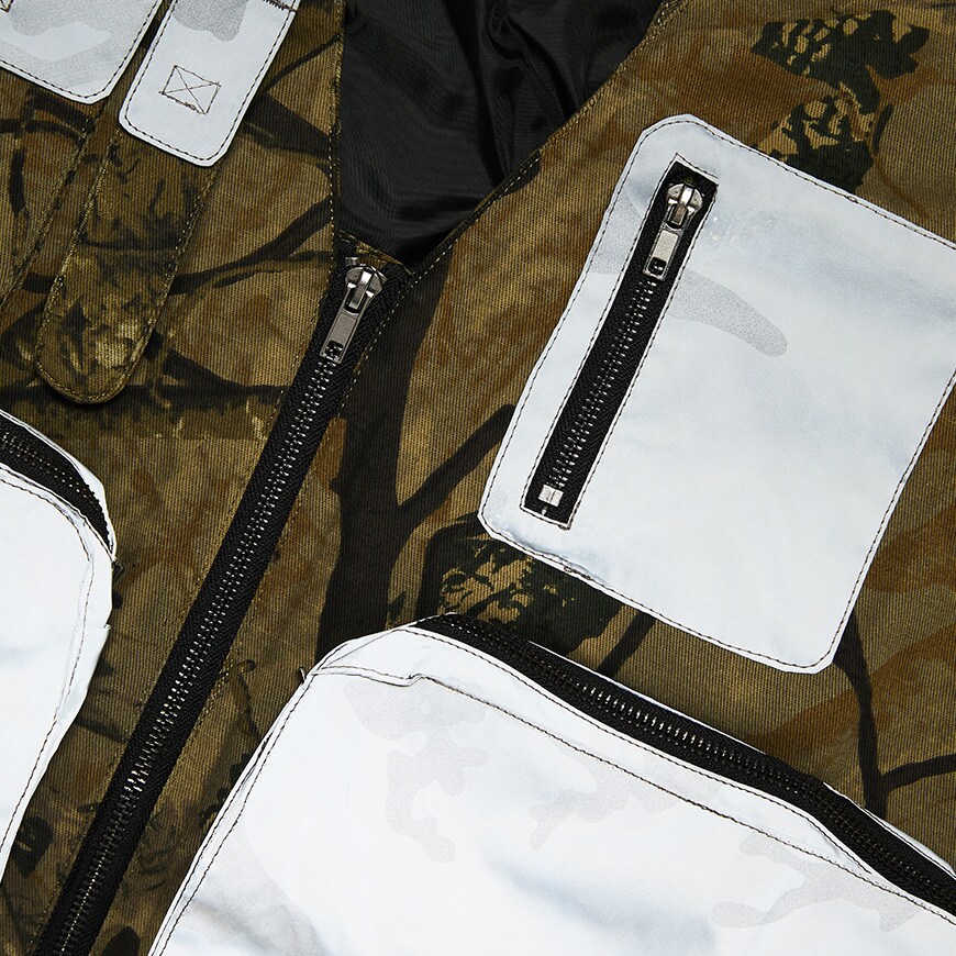 A picture of a camo utility gilet with reflective pockets. Available at ASOS.