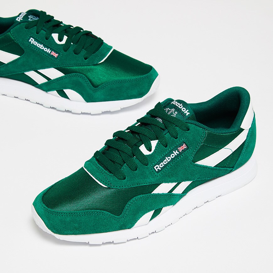 A picture of a pair of forest green Reebok Classic trainers. Available at ASOS.