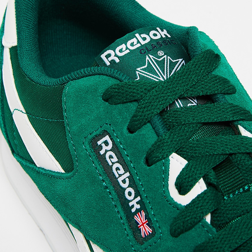 A picture of a pair of forest green Reebok Classic trainers. Available at ASOS.