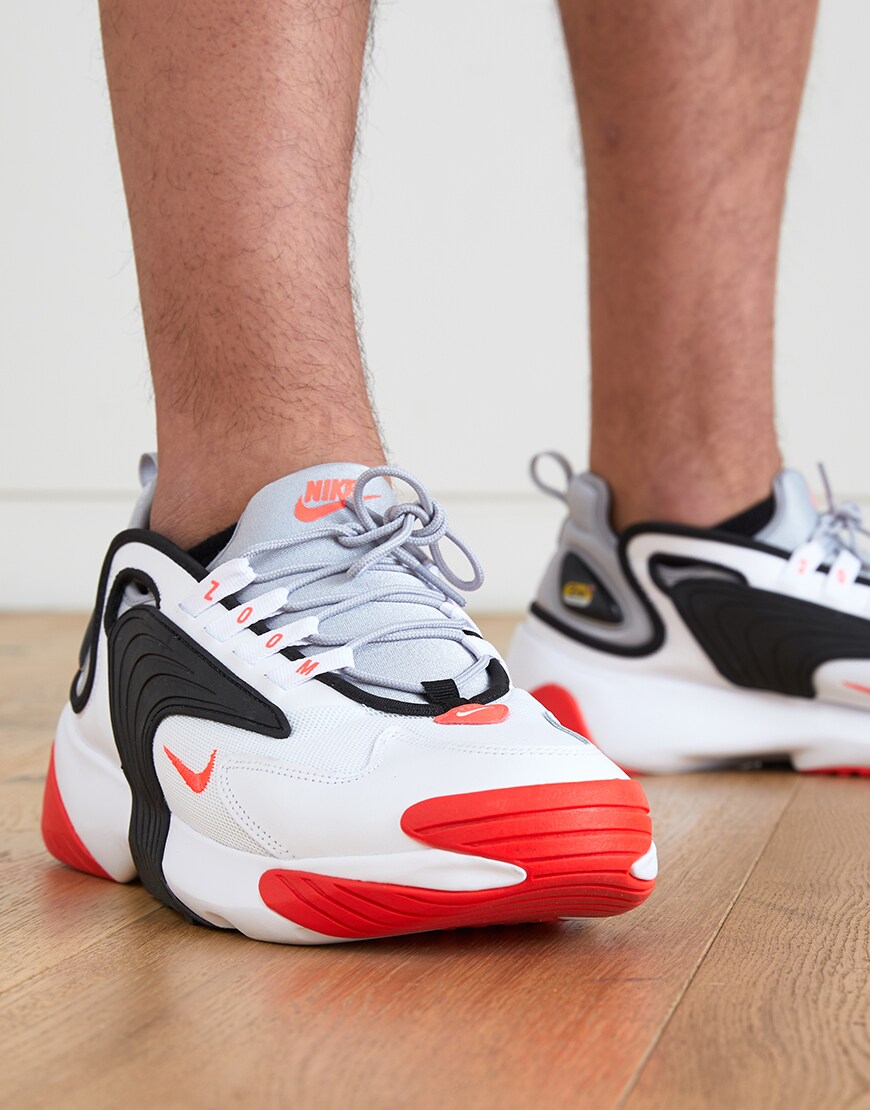 A picture of an ASOSer wearing Nike Tekno Zoom 2K trainers. Available at ASOS.