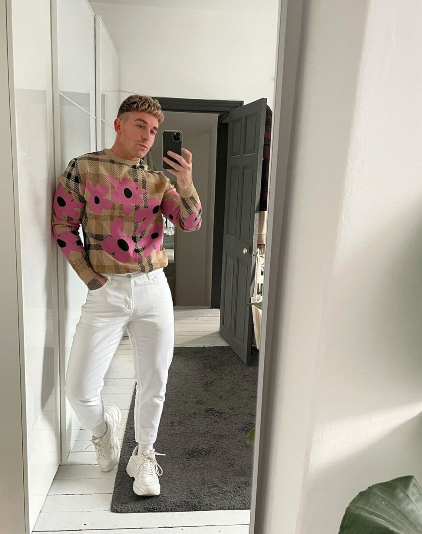 @stanleydru wearing a brown and pink floral jumper with white jeans | ASOS Style Feed
