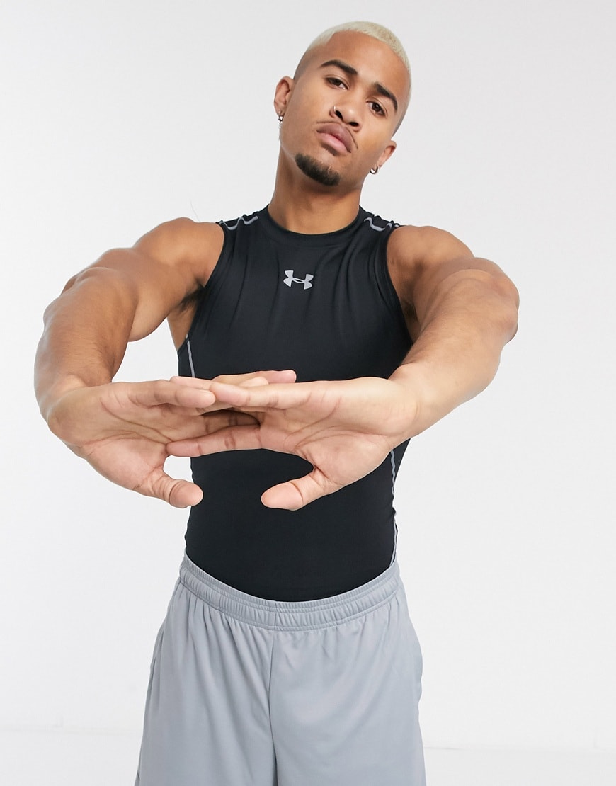 A picture of a man wearing a black sports vest by Under Armour