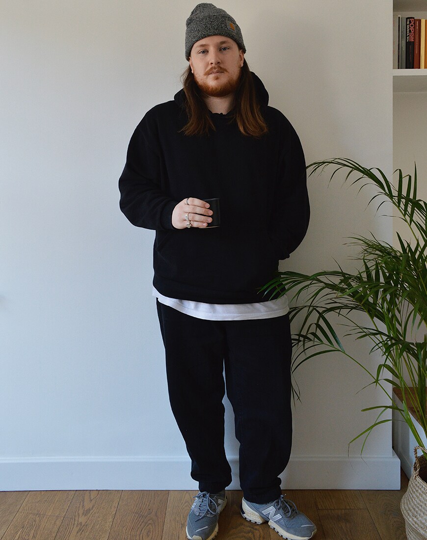 A picture of a man wearing an oversized hoodie, a beanie and balloon-fit jeans. Available at ASOS.
