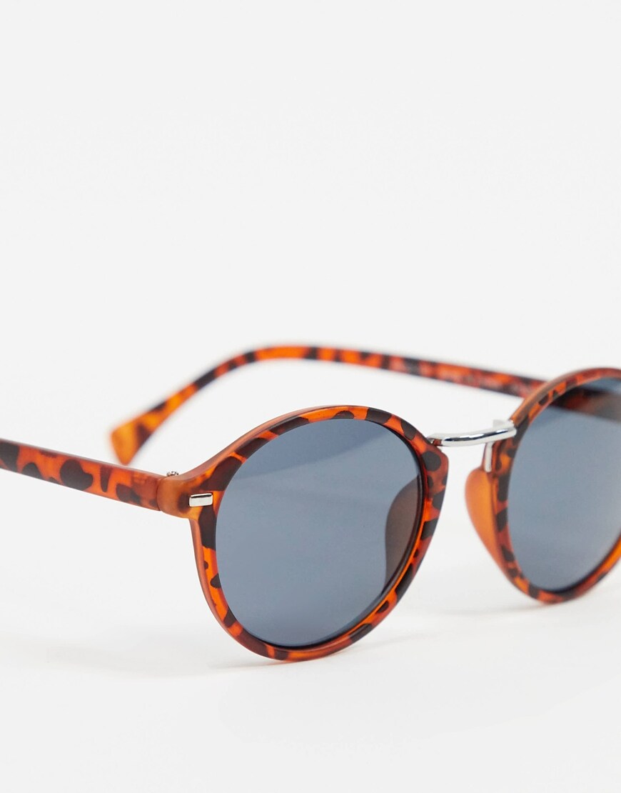 A picture of a pair of round sunglasses in a tortoiseshell design by A.J. Morgan. Available at ASOS,