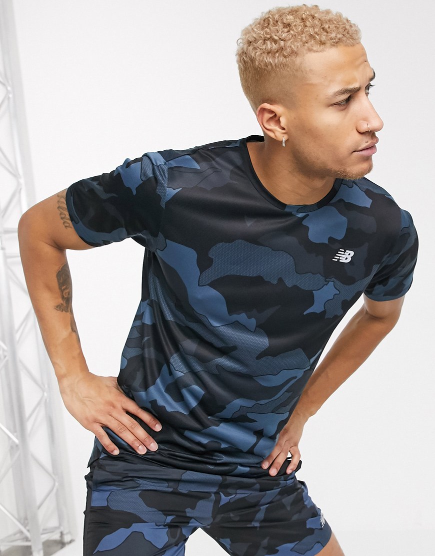 A picture of a model wearing a camo print running T-shirt by New Balance. Available at ASOS.