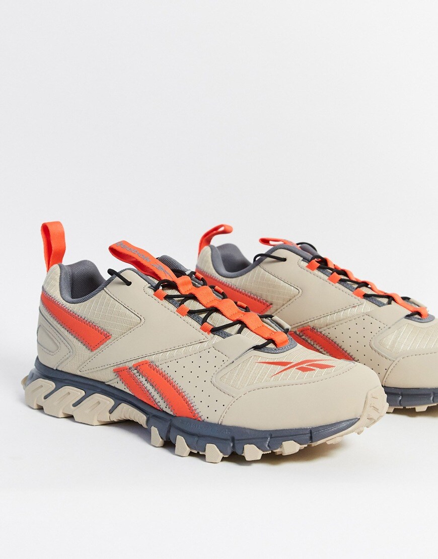 Reebok Classics DMXpert trainers in tan and orange. Available at ASOS.