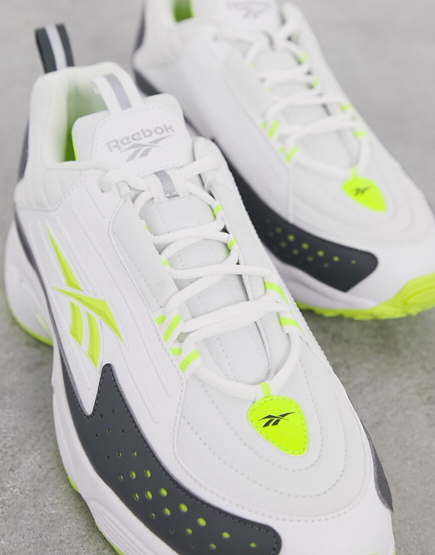 Reebok Classics DMX Series 2200 sneakers in a white and neon-green colourway. Very fresh. Available at ASOS.