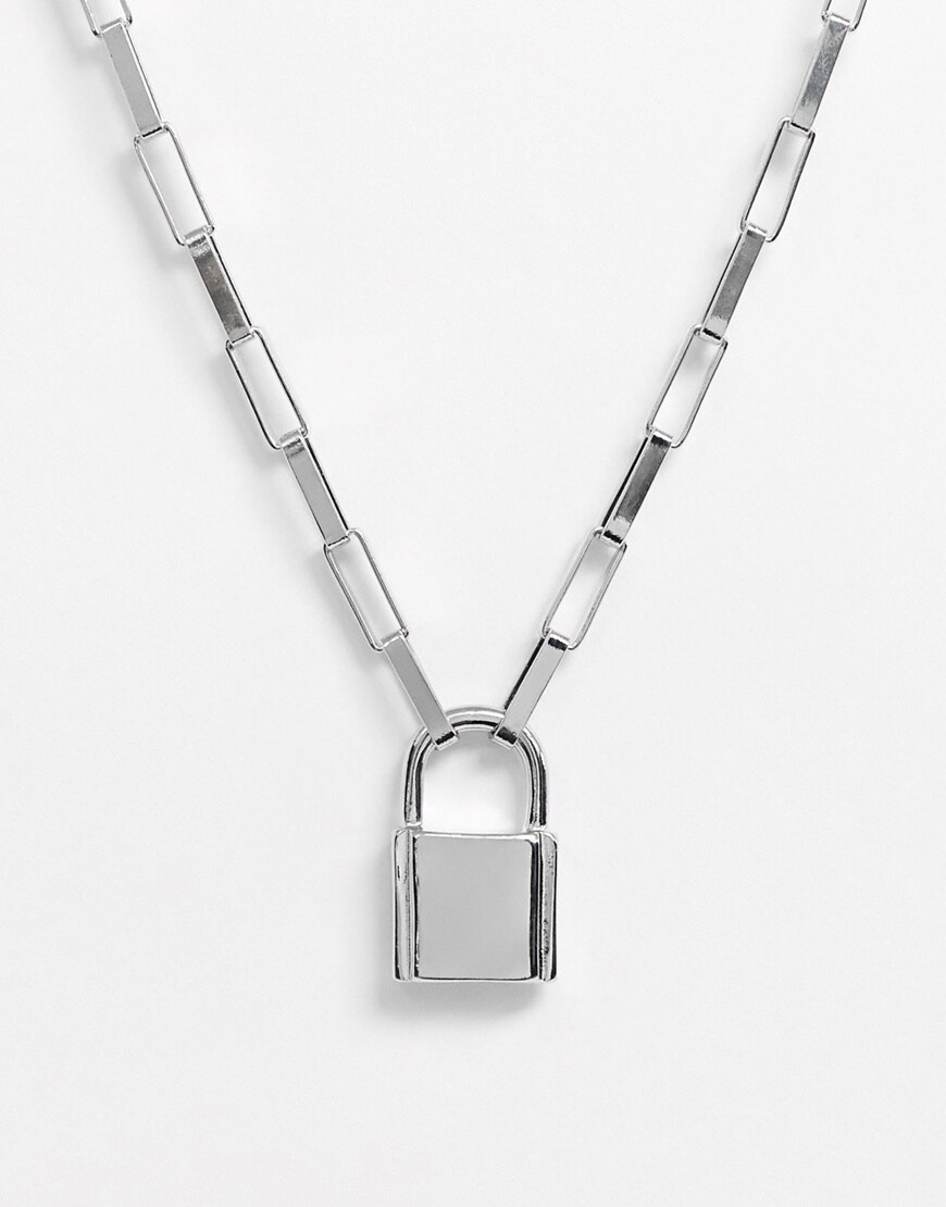 A picture of a silver-tone chain necklace with a padlock pendant. Very 90s, very grunge. Available at ASOS.