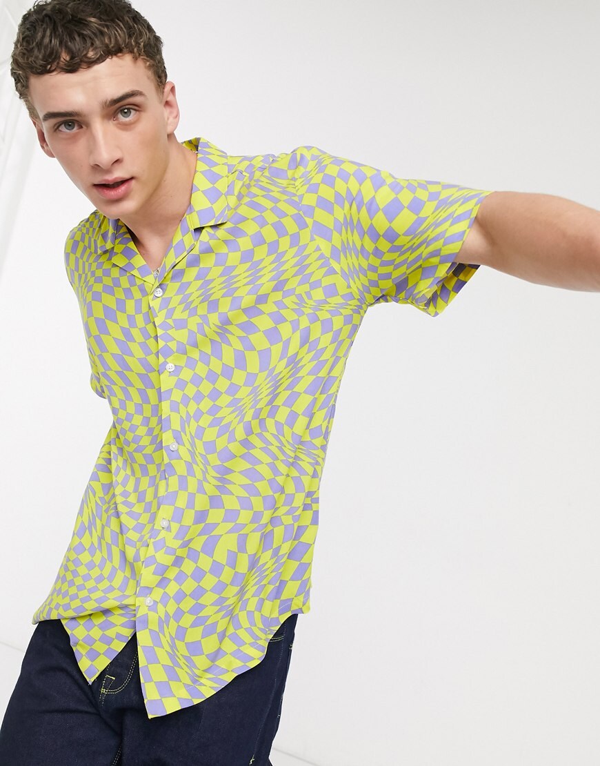 A picture of a man wearing a yellow and grey check shirt by Collusion | ASOS STYLE FEED