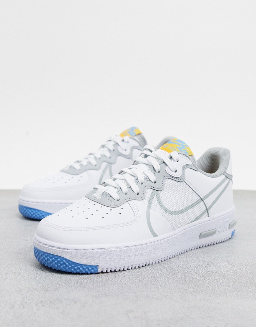 A picture of a pair of white grey and blue trainers by Nike | ASOS STYLE FEED