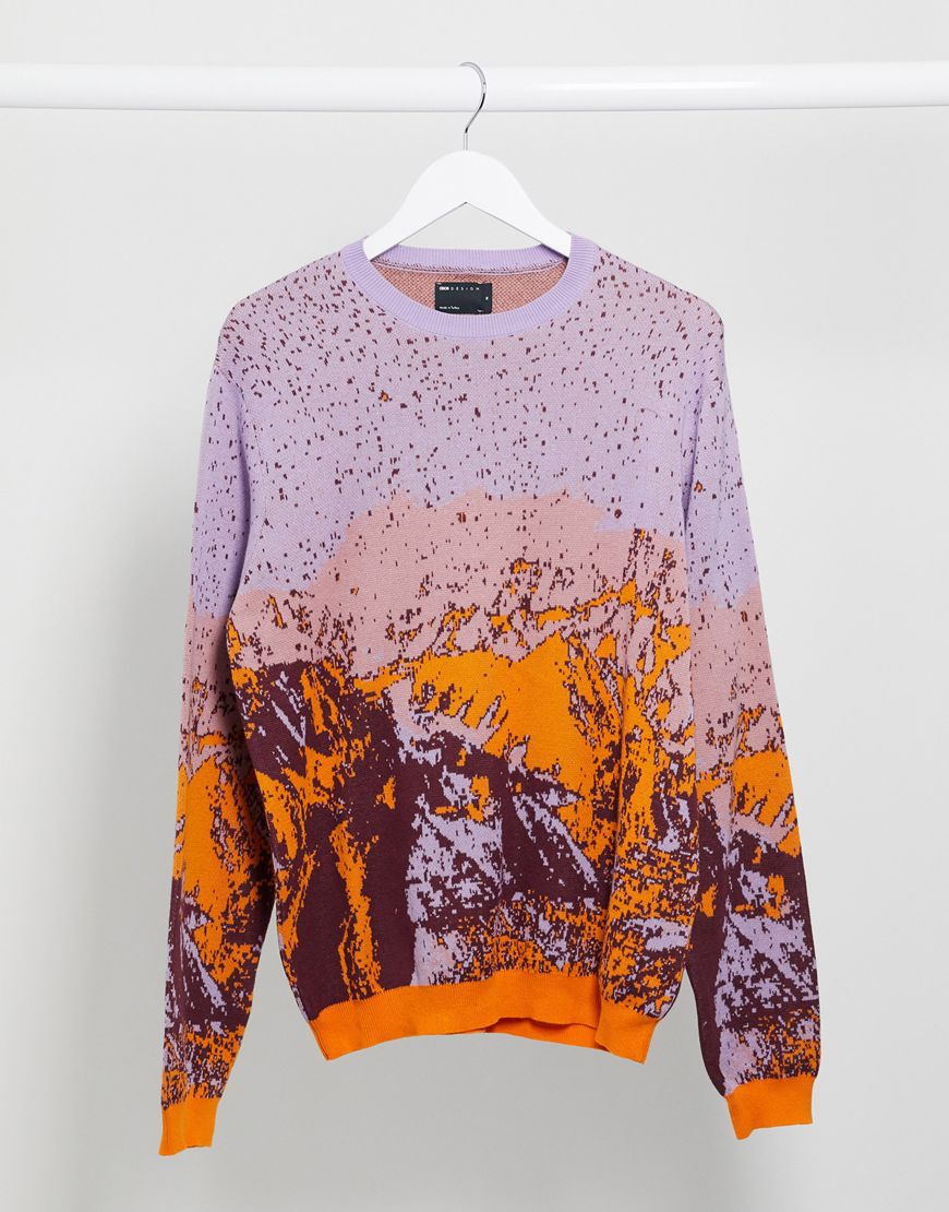 A picture of a jumper with a mountain landscape in sunset colours by ASOS DESIGN | ASOS STYLE FEED
