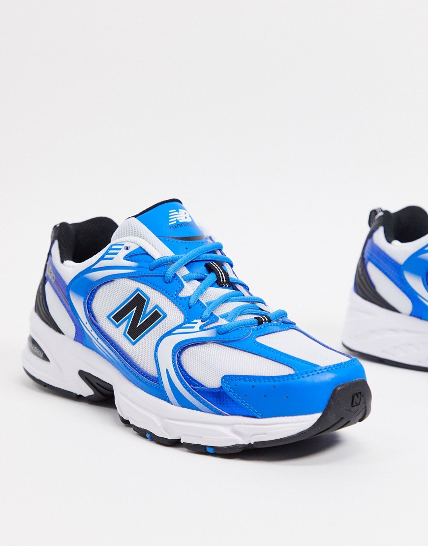 A picture of a pair of blue trainers by New Balance | ASOS Style Feed