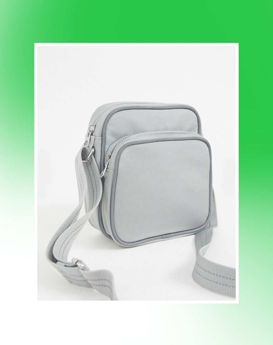 A picture of a grey ASOS DESIGN flight bag available at ASOS | ASOS Style Feed