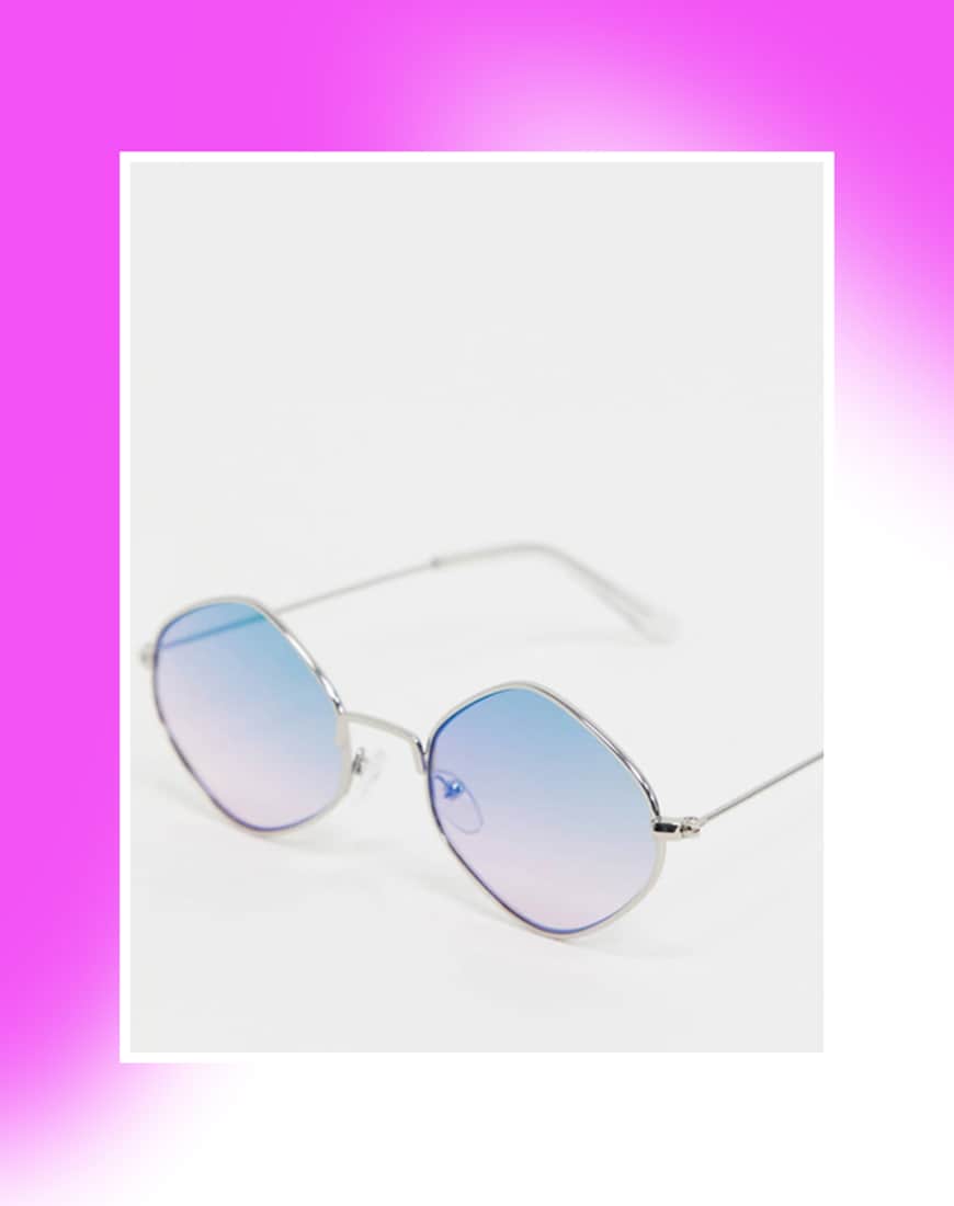 A picture of a pair of oval sunglasses with blue-tinted lenses. Available at ASOS | ASOS Style Feed