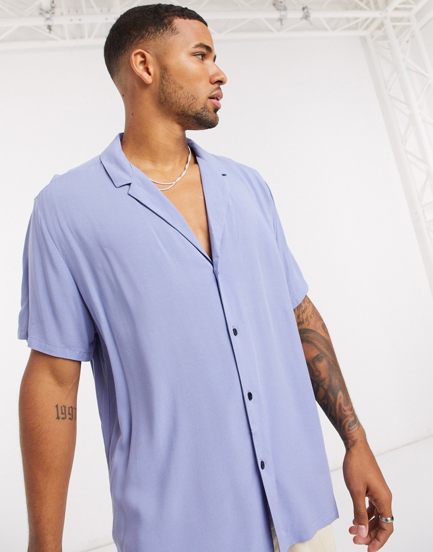 A picture of a model wearing a lilac revere collar shirt by ASOS DESIGN. Available at ASOS | ASOS Style Feed