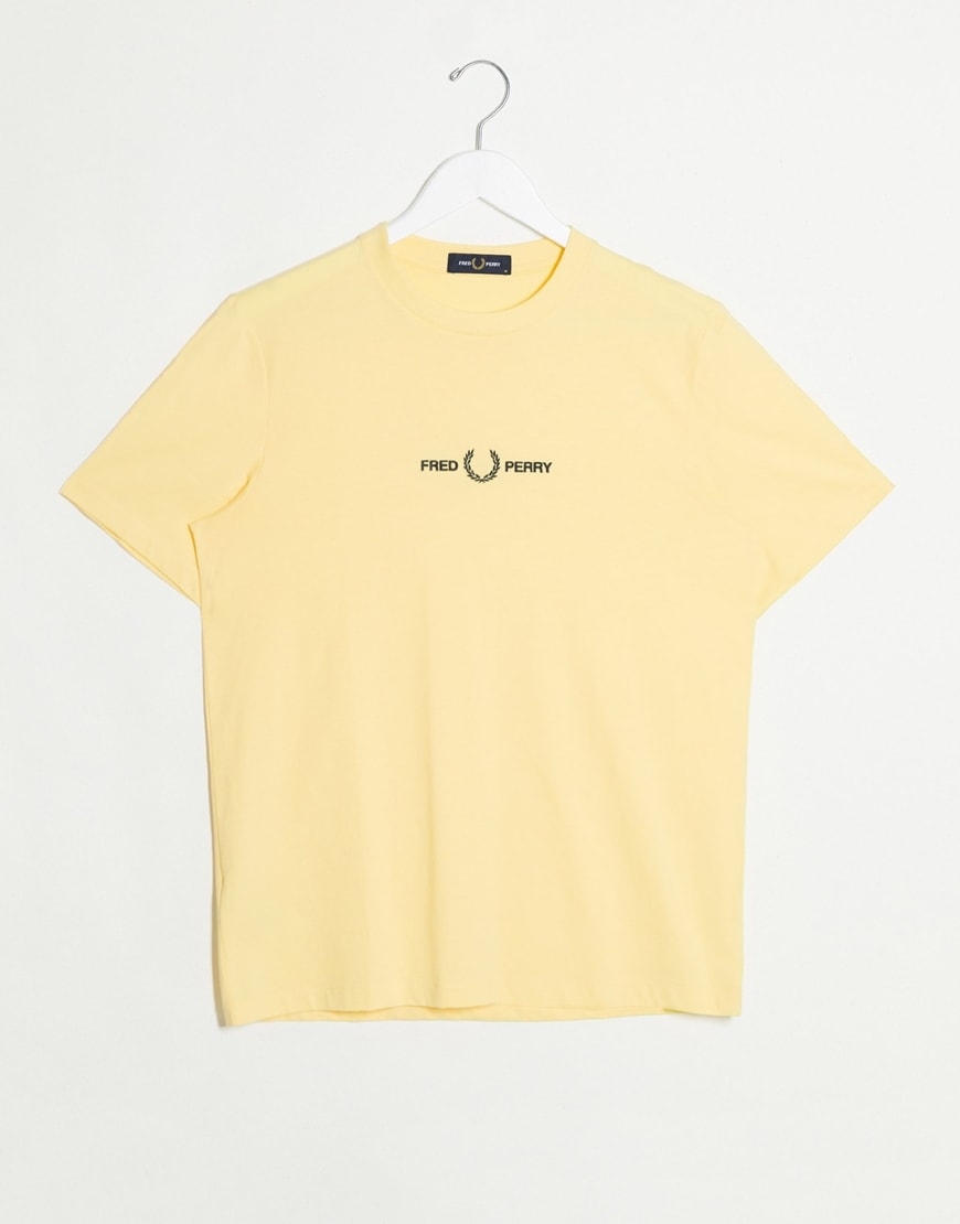 A picture of a pastel yellow T-shirt by Fred Perry. Available at ASOS | ASOS Style Feed