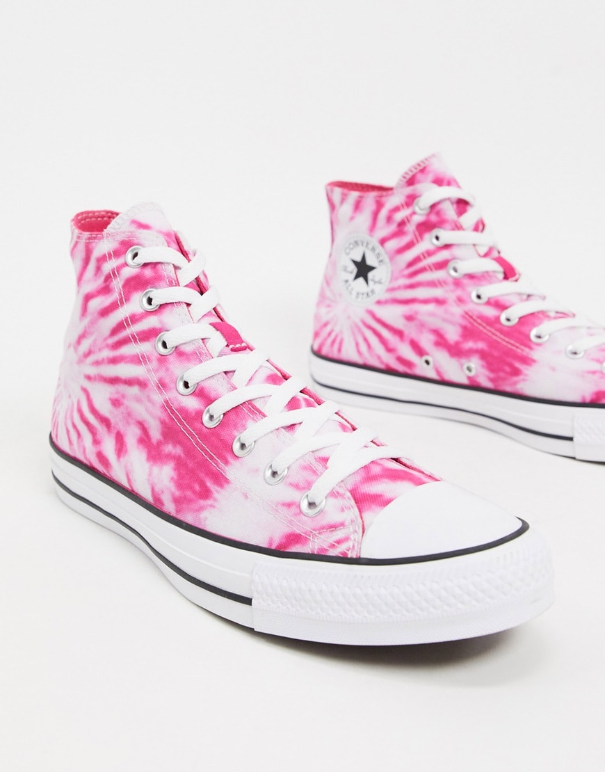 A picture of a pair of pink tie-dye Converse Chuck Taylor All Star Hi sneakers. Available at ASOS | ASOS Style Feed