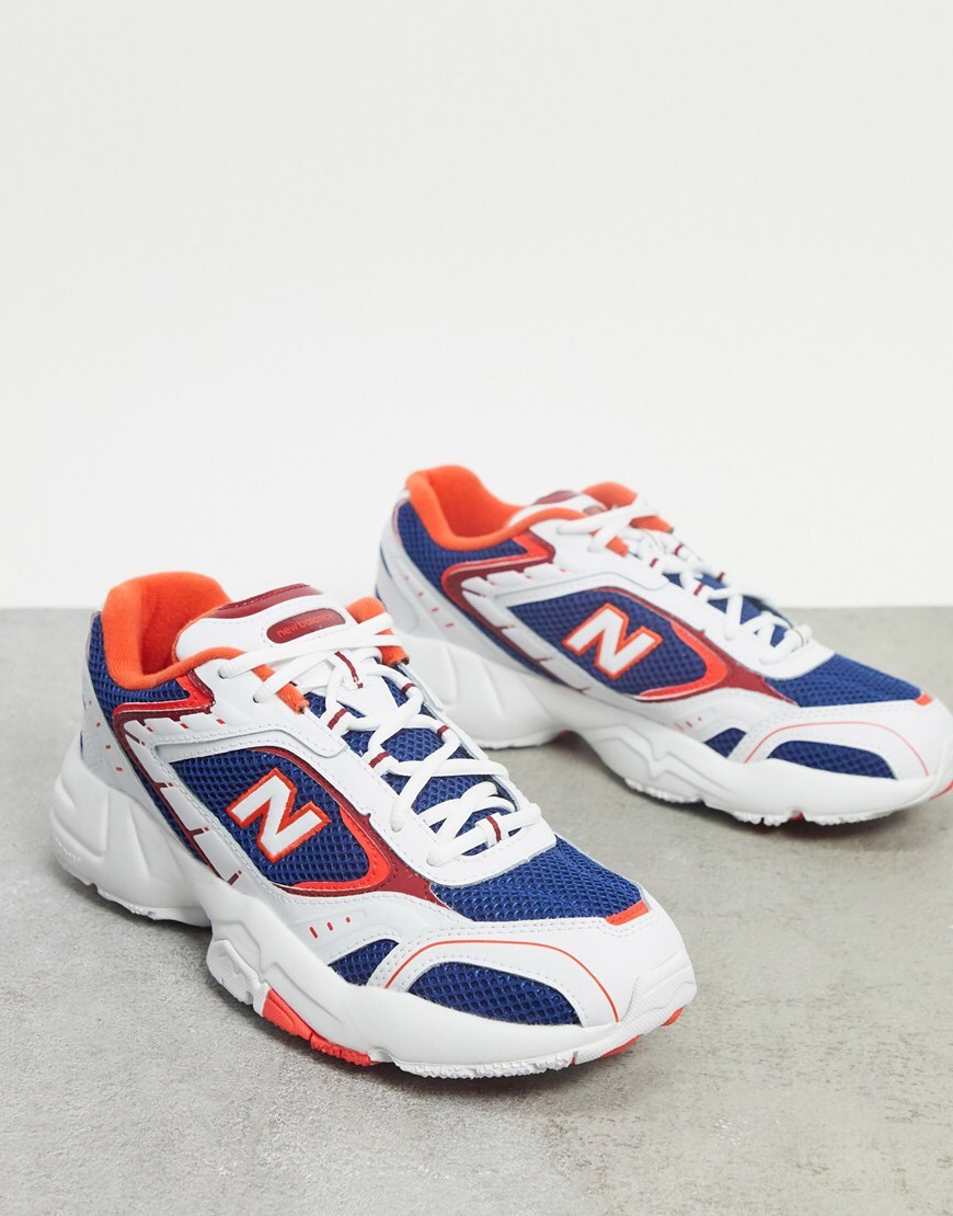 A picture of a pair of New Balance 452 trainers in a white, blue and orange colourway. Available at ASOS | ASOS Style Feed