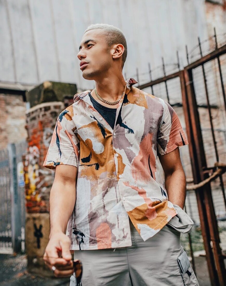 A picture of a man wearing a watercolour print shirt in neutral tones. Available at ASOS | ASOS Style Feed
