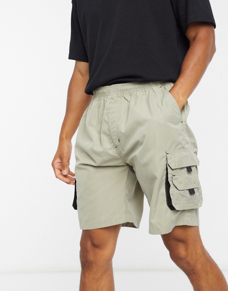 Picture of beige cargo shorts by ASOS Design