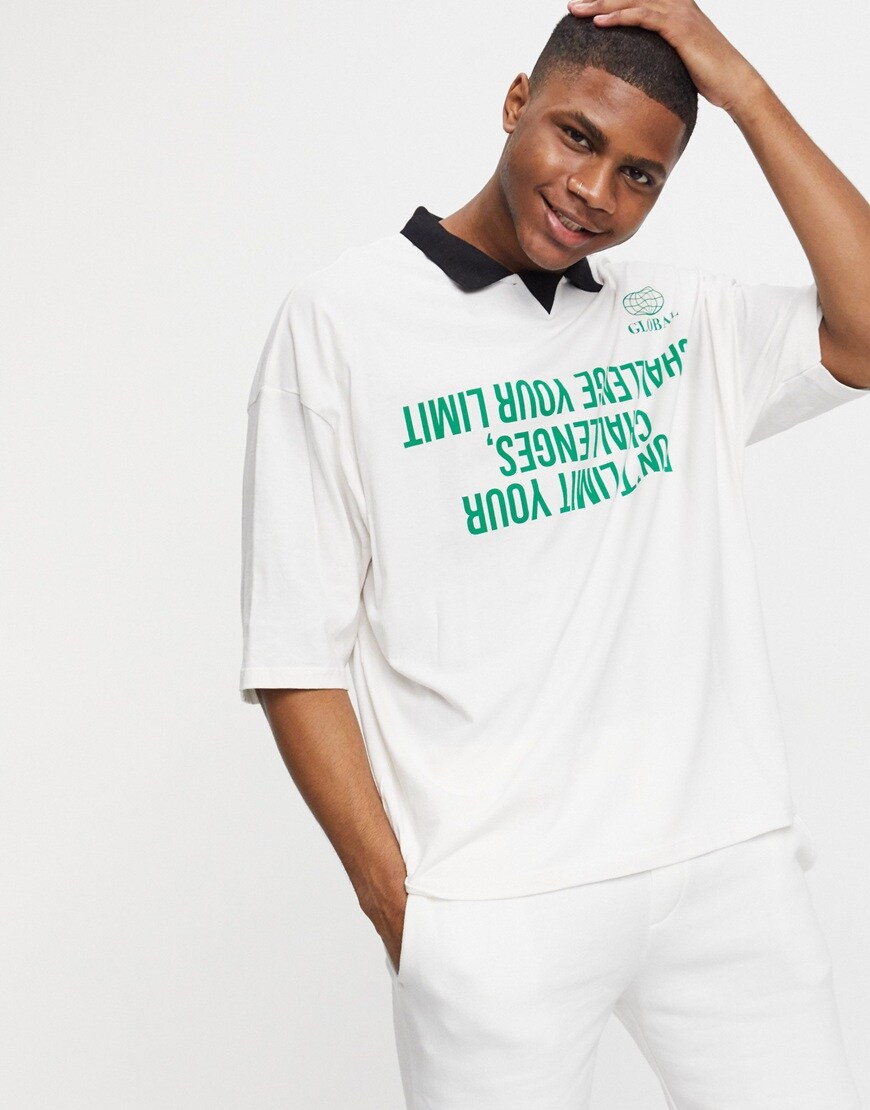 Picture of white polo neck with graphic print by ASOS Design