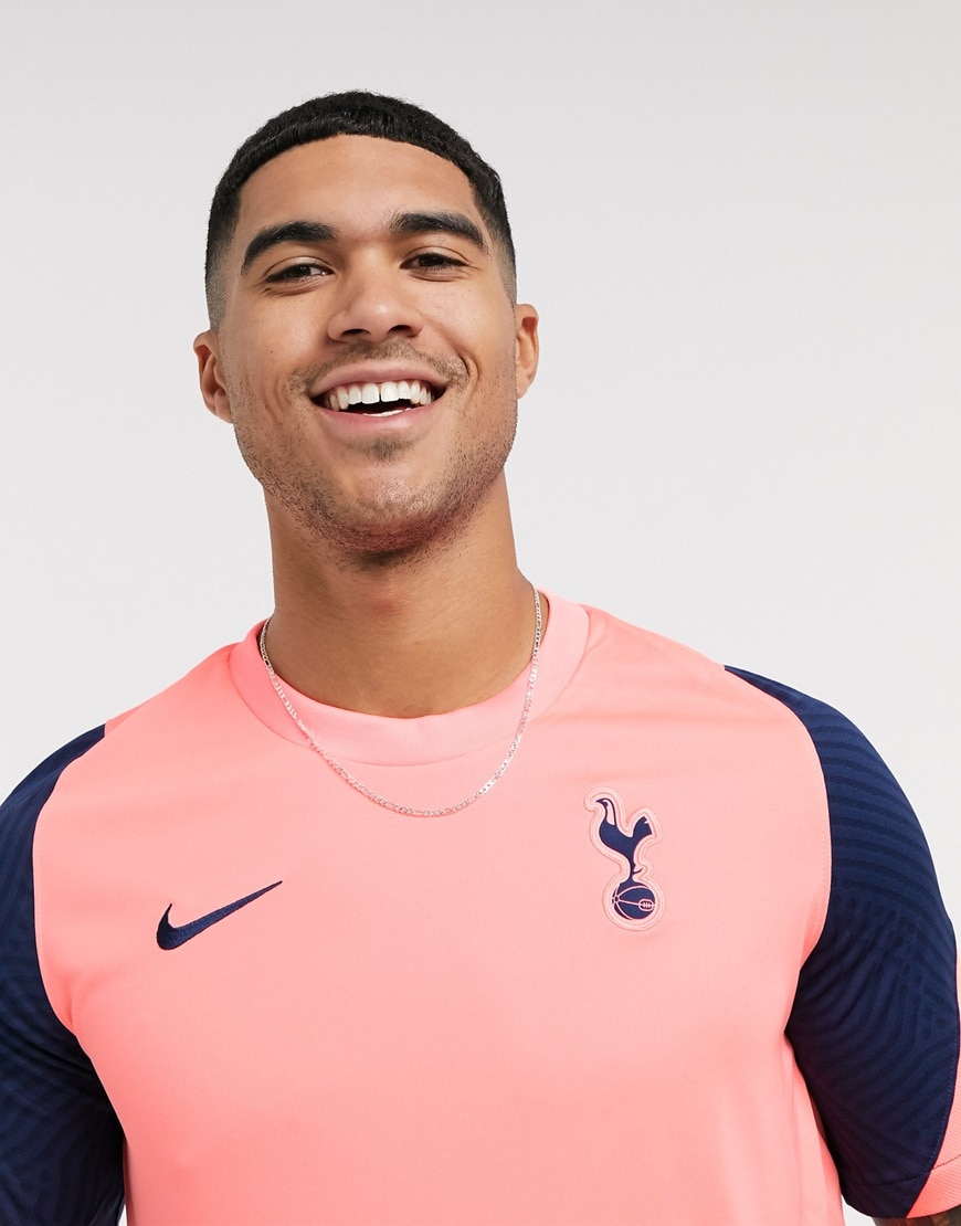 A picture of a model wearing Tottenham Hotspur FC's 2020/21 training jersey. Now available at ASOS | ASOS Style Feed