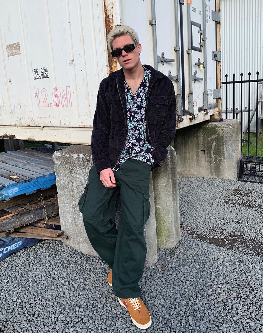ASOS Jono wearing a printed shirt and cargo trousers | ASOS Style Feed