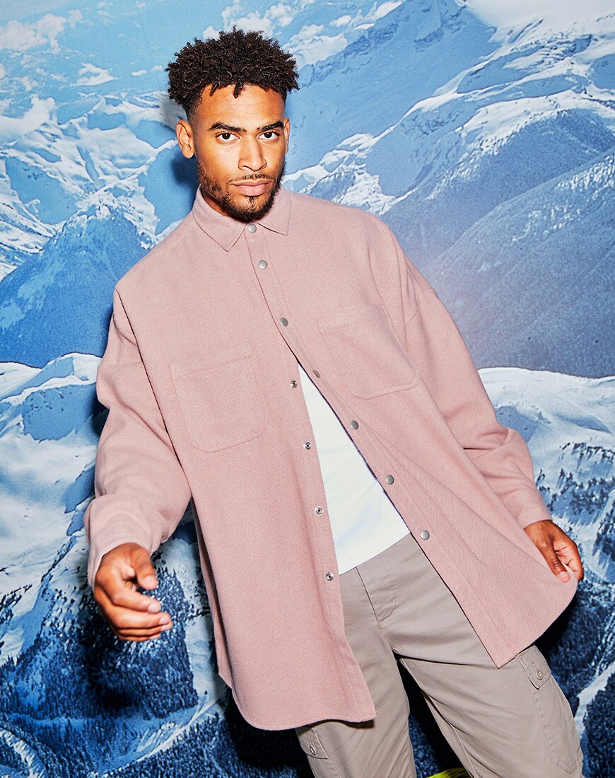 A picture of TV star Jordan Hames wearing an oversized pastel shirt and pastel cargo trousers from the new ASOS DESIGN Must-Haves collection. Available at ASOS | ASOS Style Feed