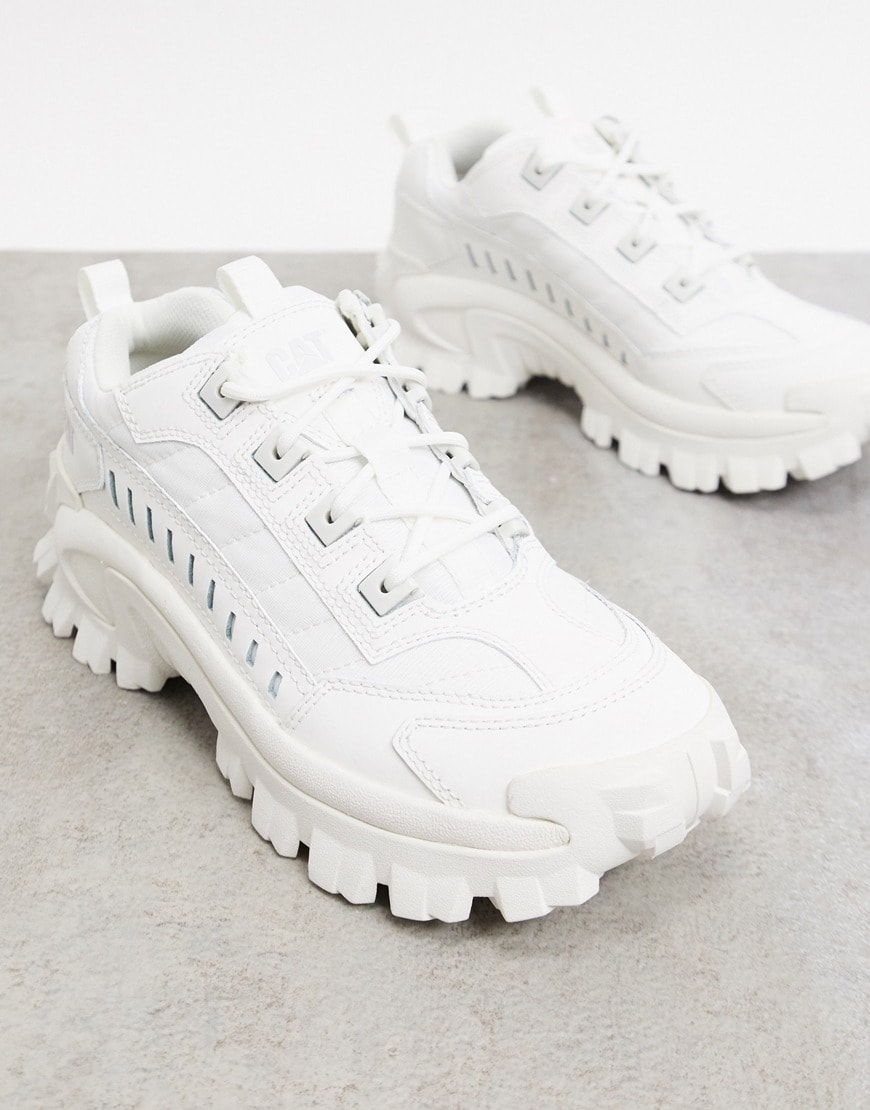A picture of a pair of triple-white Cat Intruder sneakers. Available at ASOS | ASOS Style Feed