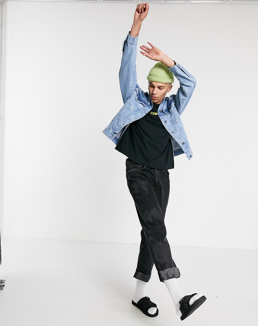 A picture of a male model wearing a unisex denim jacket that can be totally recycled. Part of the new ASOS DESIGN Circular Collection | ASOS Style Feed