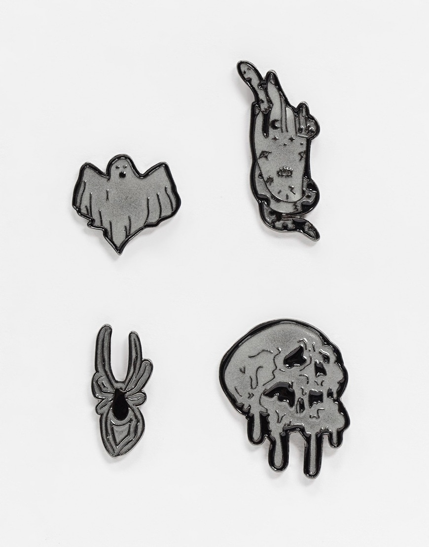 A picture of four glow-in-the-dark Halloween pin badges. Available at ASOS | ASOS Style Feed