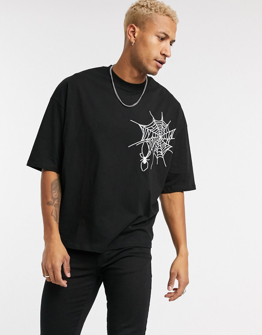 A picture of a model wearing a spider graphic T-shirt. Available at ASOS | ASOS Style Feed