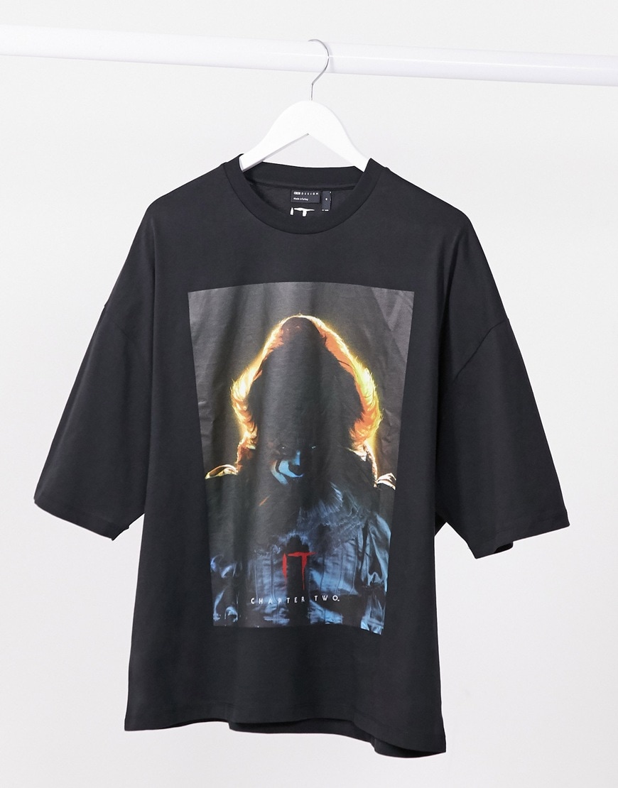 A picture of a black T-shirt featuring a graphic from the horror film IT Chapter 2 | ASOS Style Feed