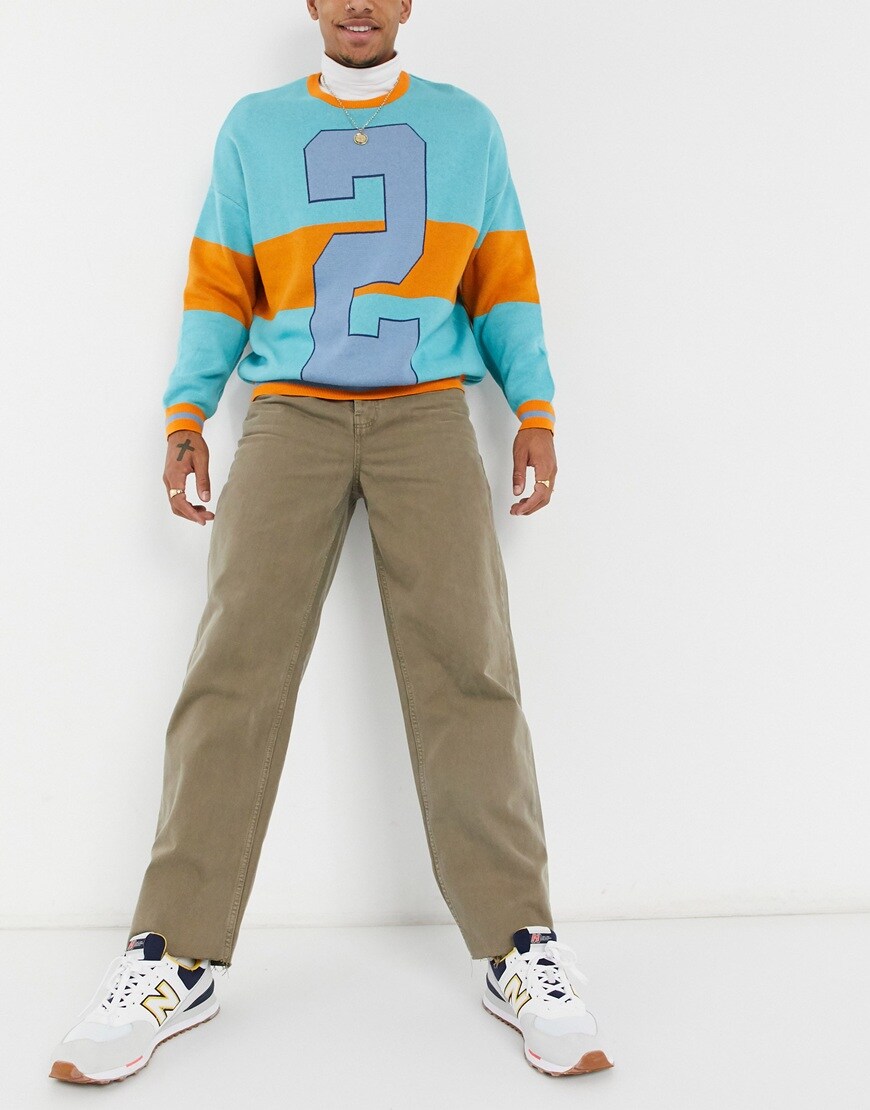 An image of a man wearing a pair of brown jeans by Collusion | ASOS Style Feed