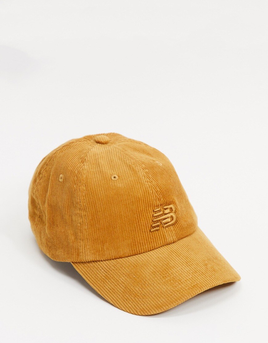 An image of a mustard cap by New Balance | ASOS Style Feed