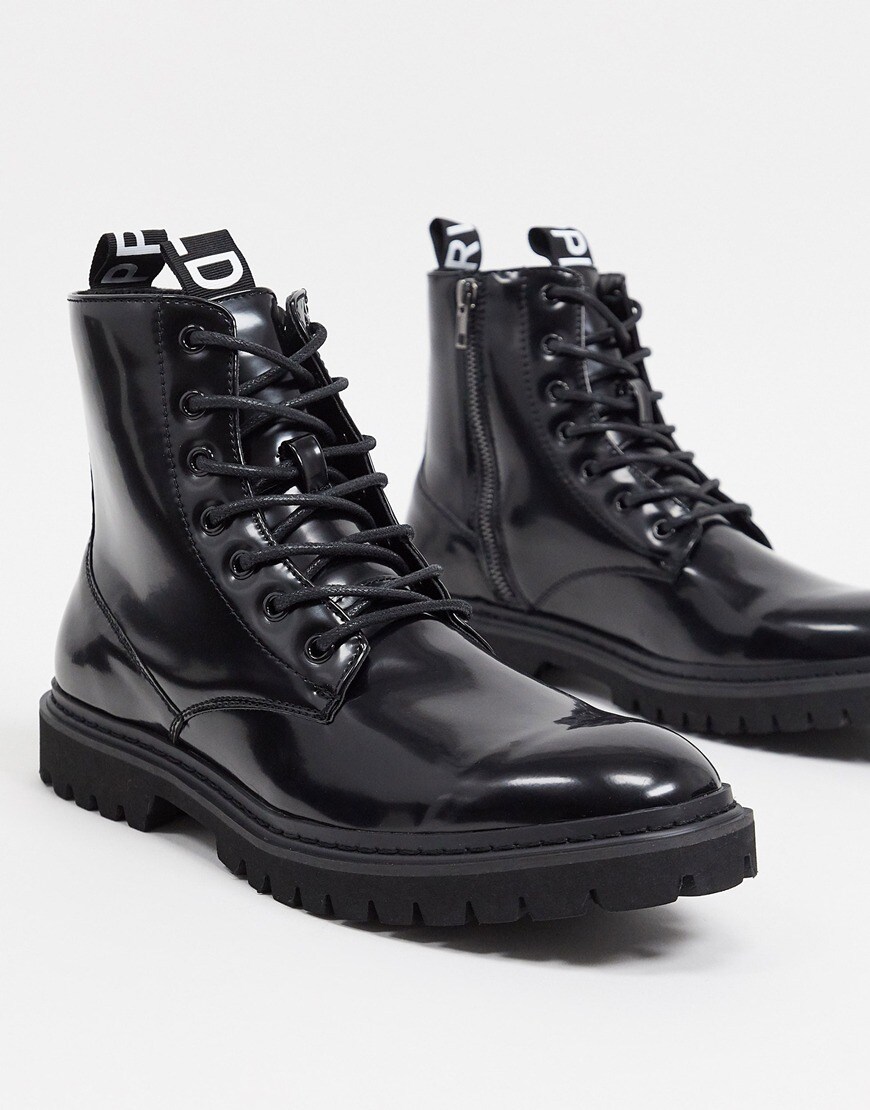A picture of a pair of black combat boots.  Available at ASOS |ASOS Style Feed
