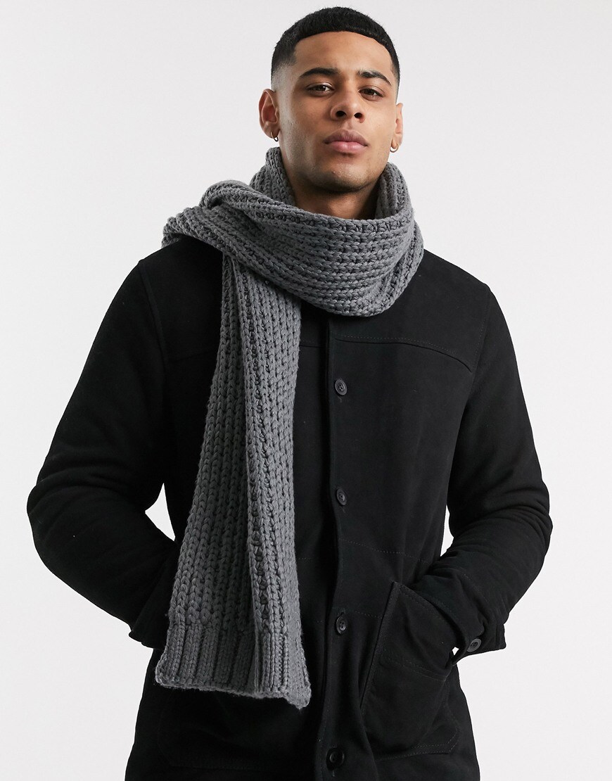 A picture of a model wearing a grey knit scarf.  Available at ASOS |ASOS Style Feed