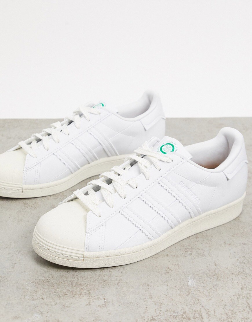 A picture of a pair of white adidas trainers,  Available at ASOS |ASOS Style Feed