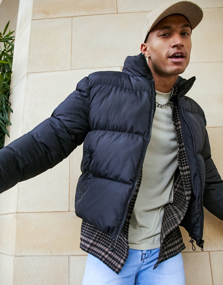 A picture of a model wearing a puffer coat.  Available at ASOS |ASOS Style Feed