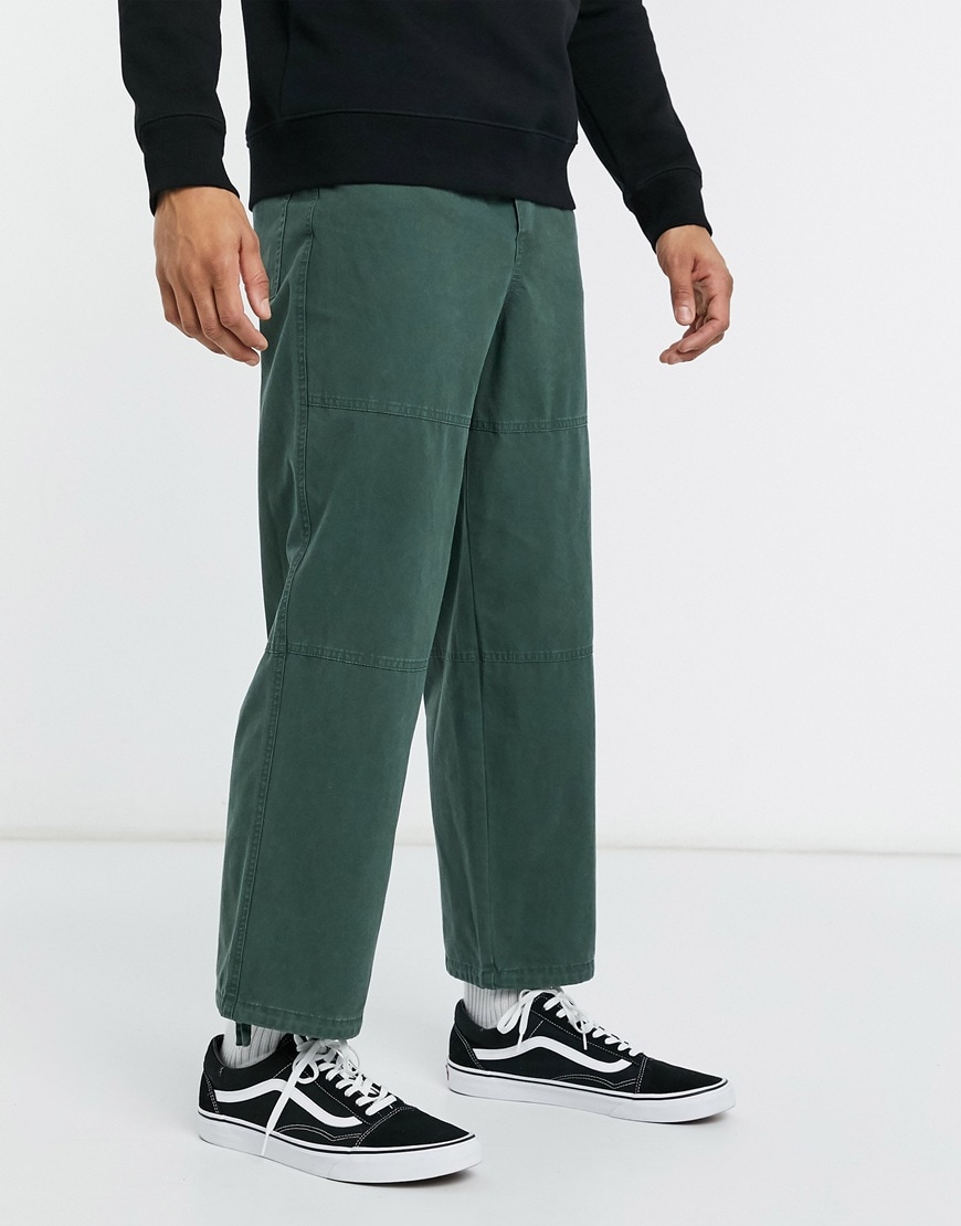 An image of a man wearing green trousers by ASOS Design | ASOS Style Feed
