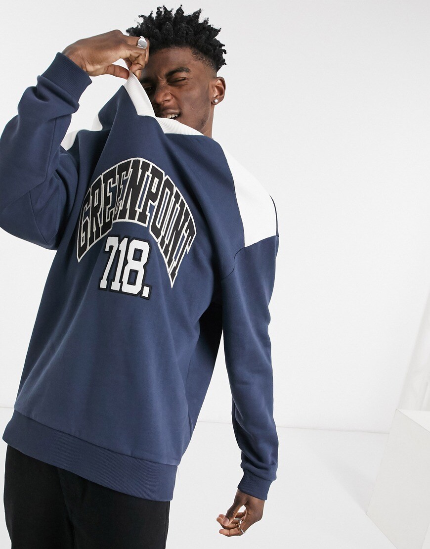 An image of a man wearing a blue jumper by ASOS Design | ASOS Style Feed