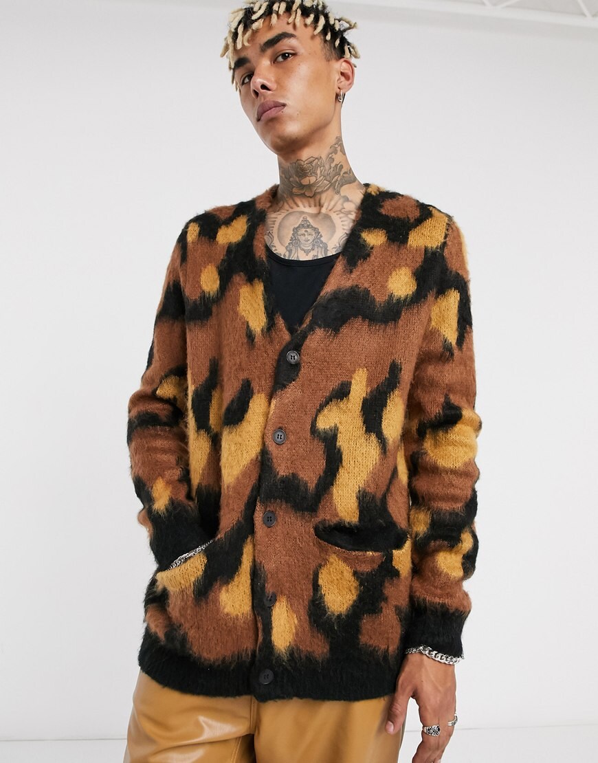 An image of a man wearing a leopard cardigan by ASOS Design | ASOS Style Feed