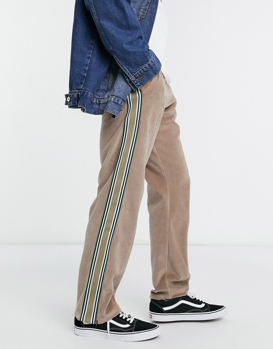 An image of a man wearing beige joggers by Jaded London | ASOS Style Feed