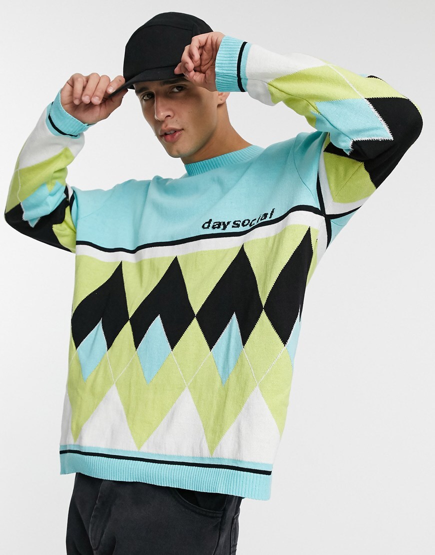An image of a man wearing a blue & green jumper by ASOS Design | ASOS Style Feed