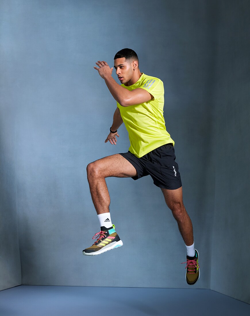A picture of a model wearing a training T-shirt, shorts and trainers by adidas. Available at ASOS | ASOS Style Feed