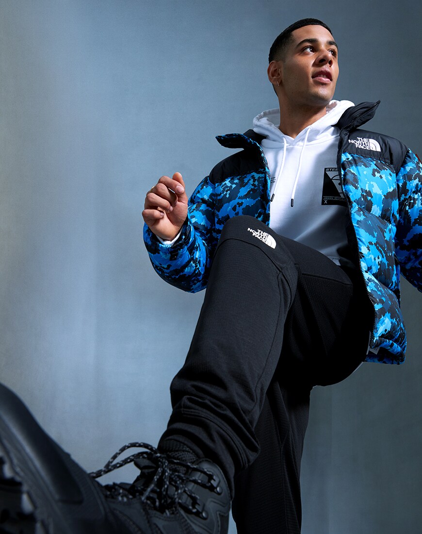 A picture of a model wearing a puffer jacket, joggers and boots by The North Face. Available at ASOS | ASOS Style Feed
