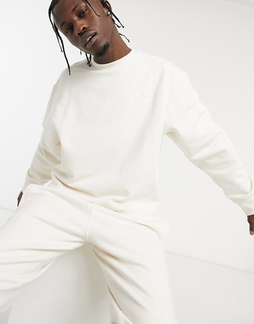 Model wearing adidas Originals premium sweatshirt co-ord