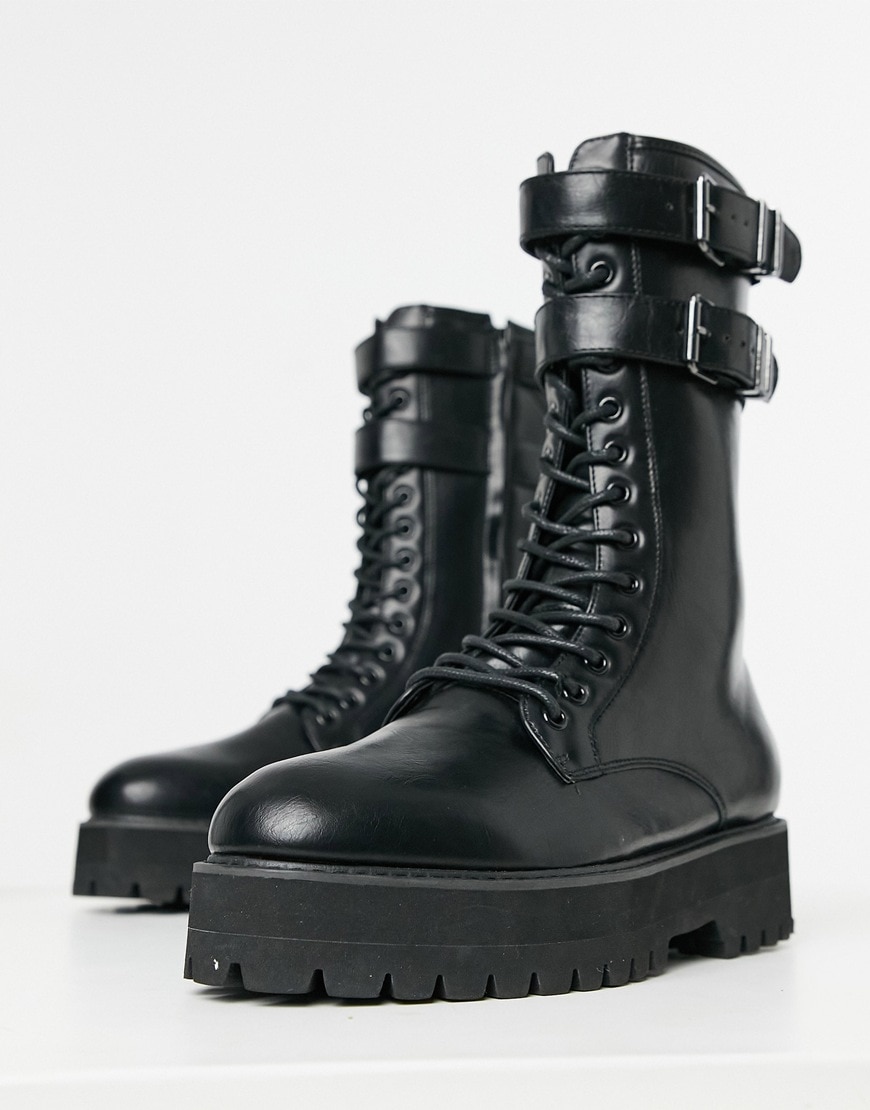 ASOS DESIGN high lace up boots in black faux leather with raised chunky sole and hardware details